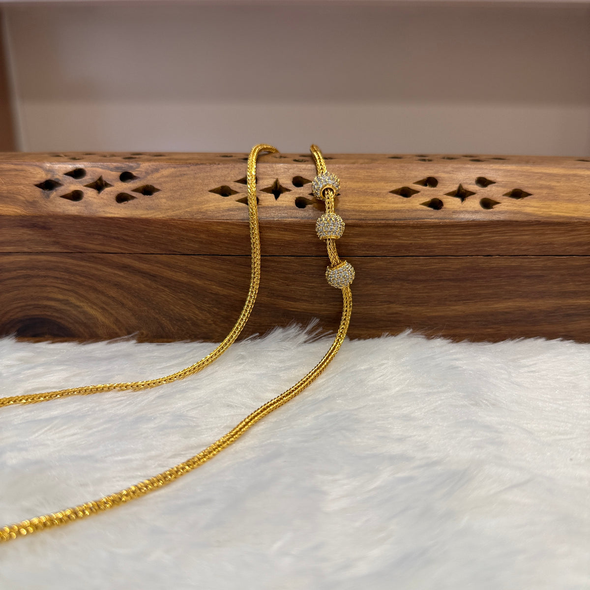 Gold Mugappu Kodi Stone