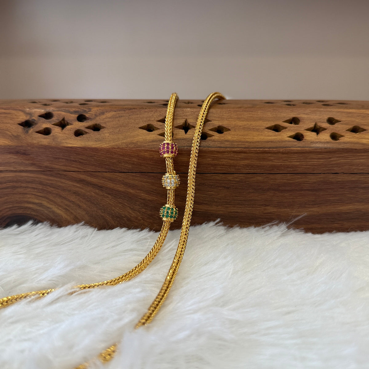 Gold Mugappu Kodi Stone