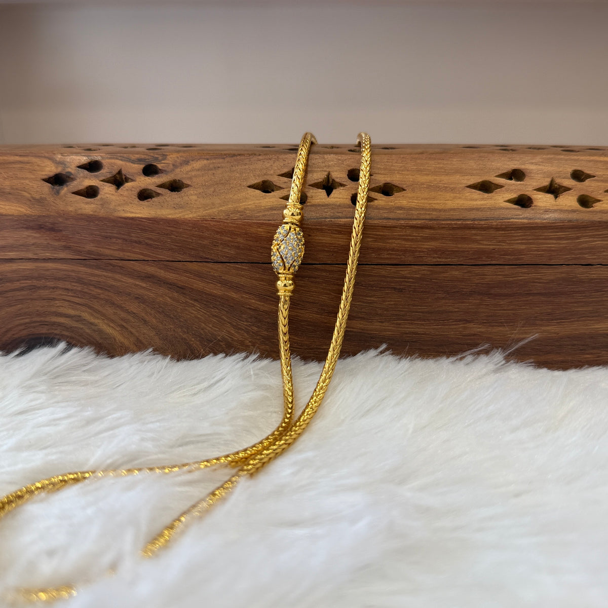 Gold Mugappu Kodi Stone